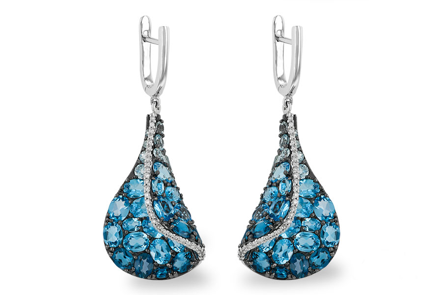 H196-59932: EARR 6.86 BLUE TOPAZ 7.05 TGW